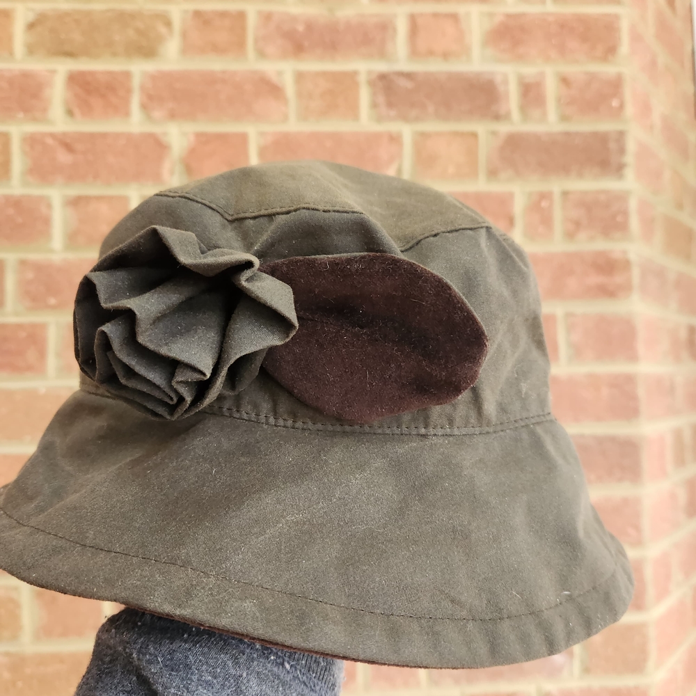 Barbour Waxed Bucket Hat With Flower Accent